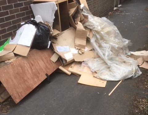 Woman fined after furniture left in entry