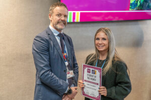 Jolie posing with certificate